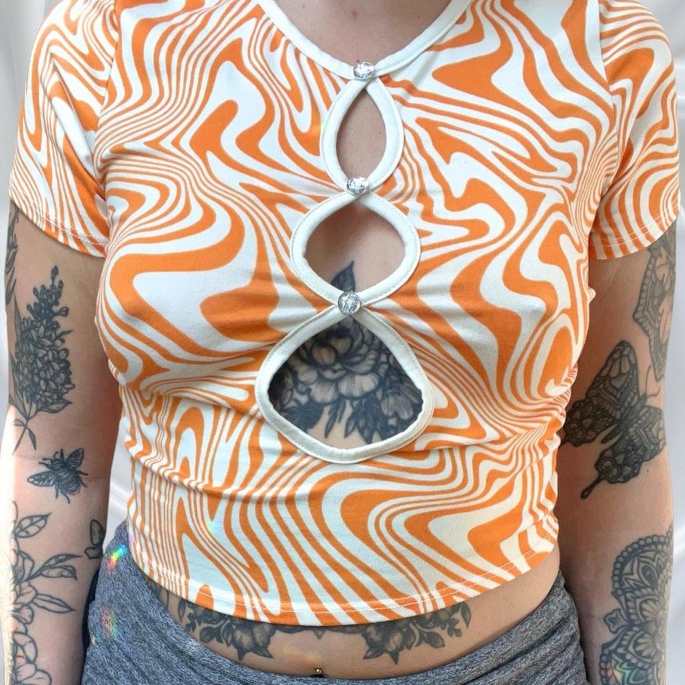 Trendy Orange Swirl Cutout Top